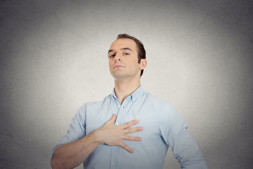 Closeup portrait arrogant aggressive bold self important uppity stuck up man with napoleon complex, short man syndrome isolated grey wall background. Negative emotion facial expression feelings